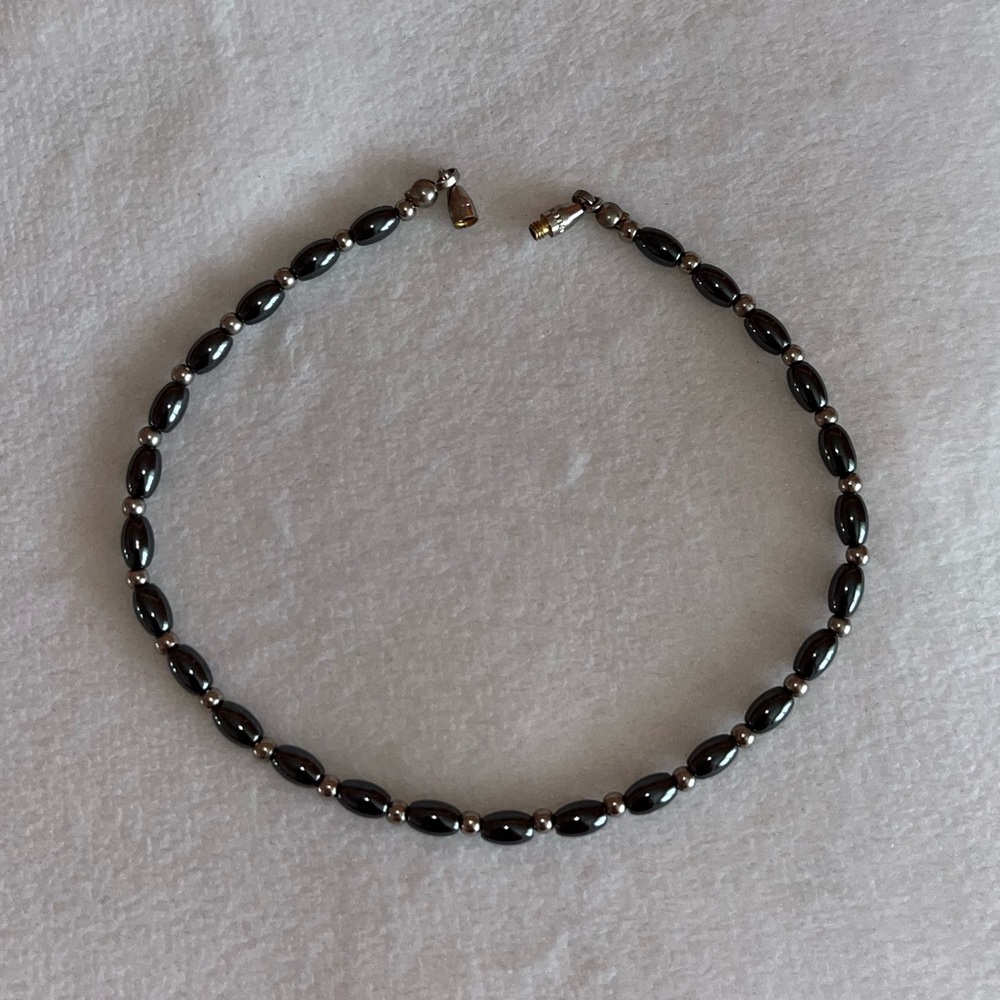 Black and gold beaded bracelet